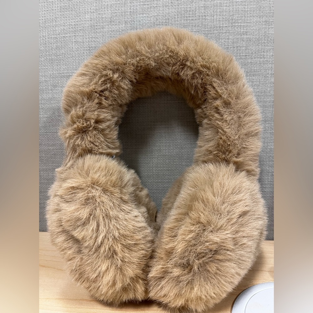 Cute tan colored ear muffs, very warm for winter